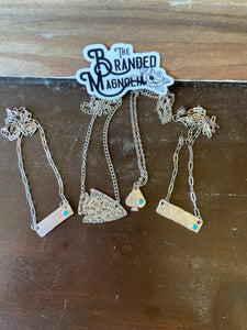 THE STAMPED NECKLACE COLLECTION