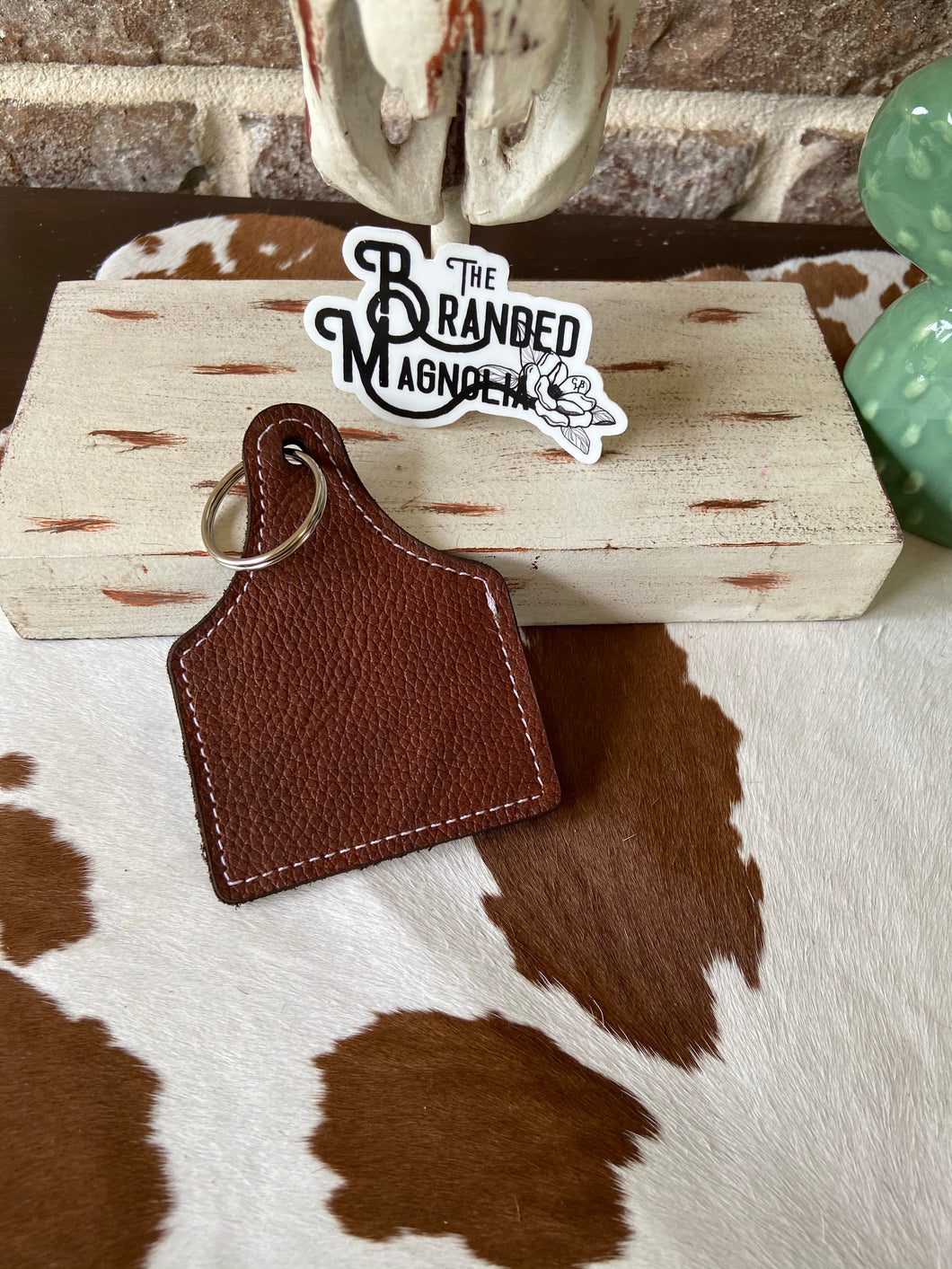 THE BRANDED EAR TAG KEYCHAIN