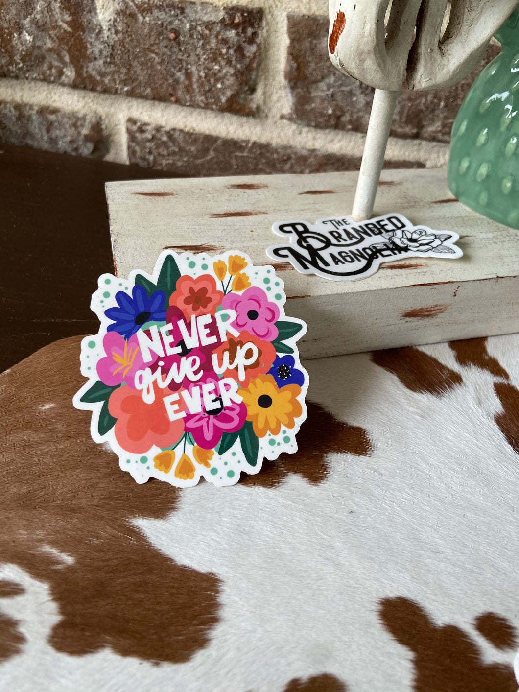 THE NEVER GIVE UP STICKER